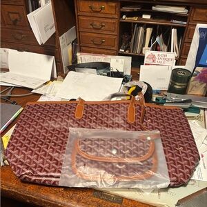 burgundy tote with light brown trim